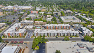 Aerial Exterior of Anton Arcade and surrounding communities, photo taken on a sunny day.